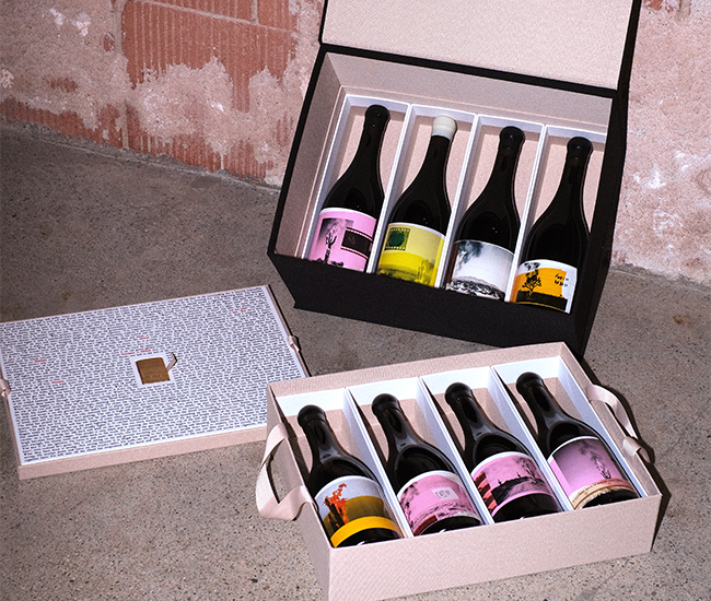 An image of the 8 Years in the Desert Edition 2 Collector's Set, including all 8 labels, a linen box, a short story by Dave himself and a special gift that directly ties back to the story.